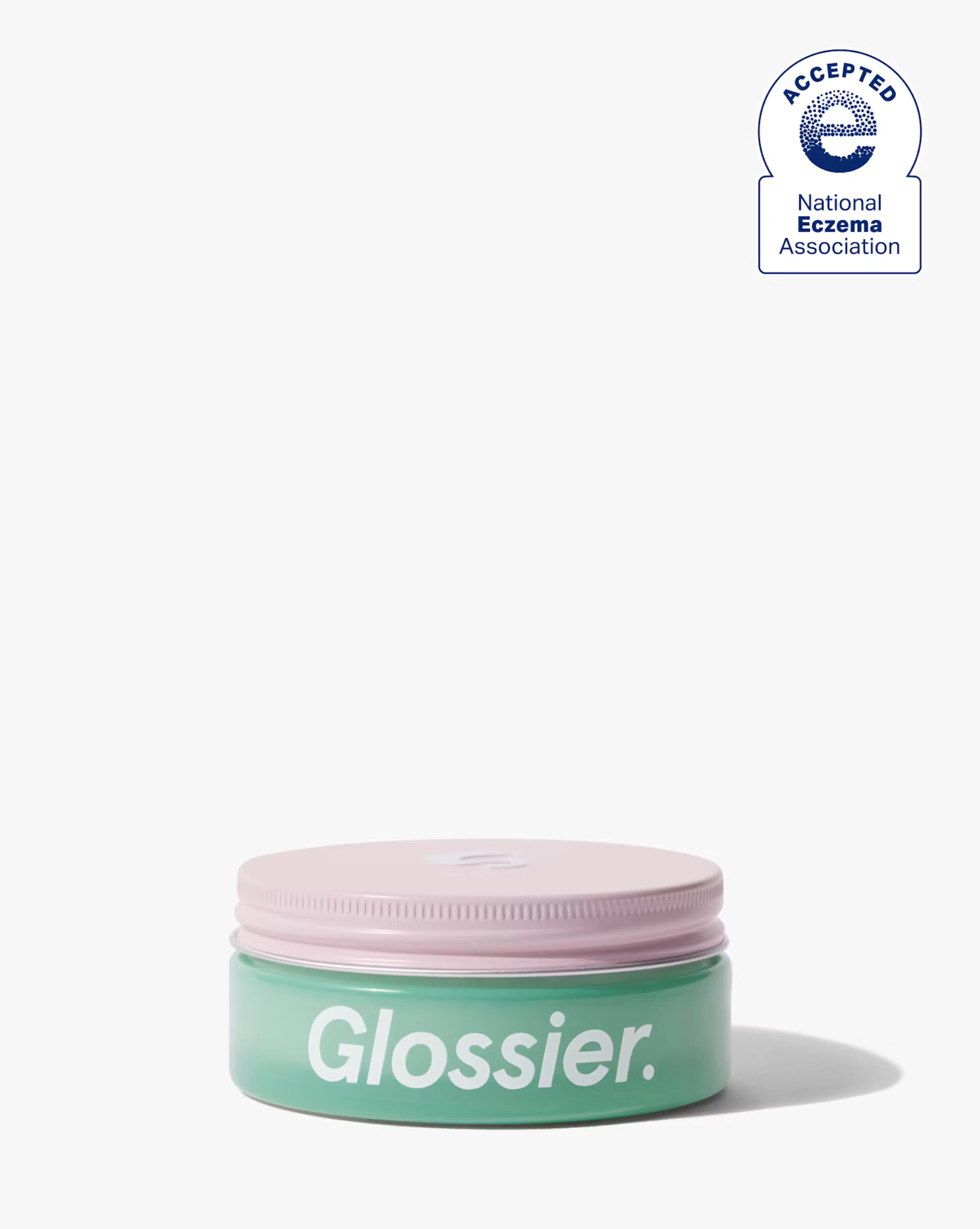 After Baume jar in pink and green on a white shelf