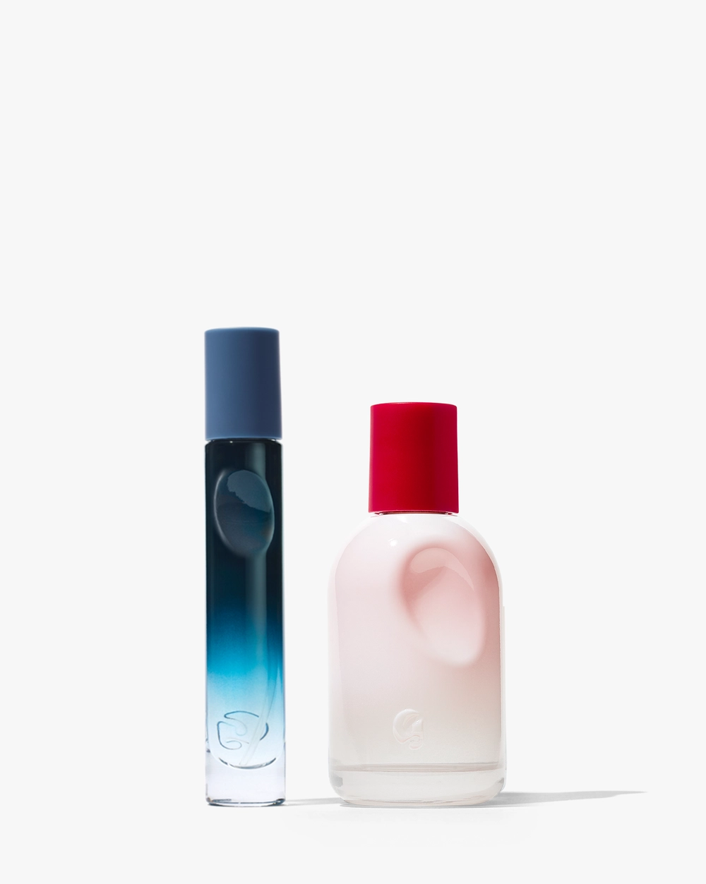 Fragrance Two Ways: a blue bottle and a white and red bottle side by side
